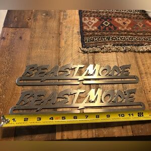 Pair of Metal Running and Triathlon Medal Hangers Holders Beast Mode